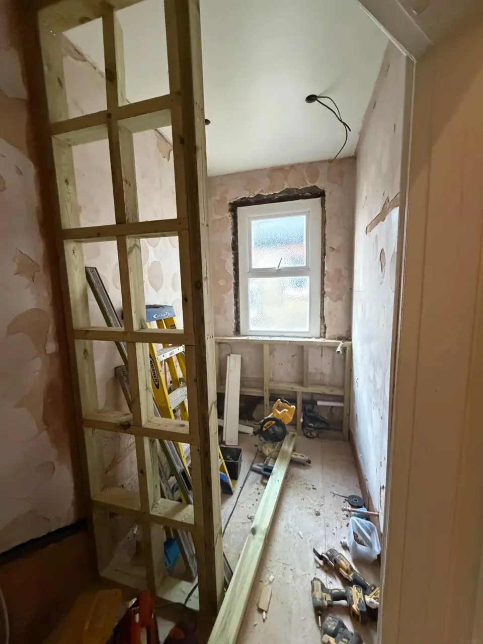 Timber framing installed during shower-room rebuild