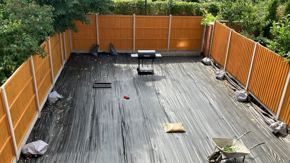 Garden cleared and covered with weed membrane
